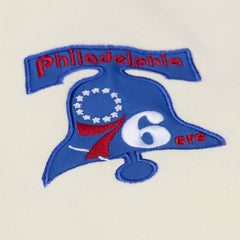 Philadelphia 76ers Hardwood Classics Chainstitch Premium Fleece Hoodie - Cream | Mitchell & Ness for sale