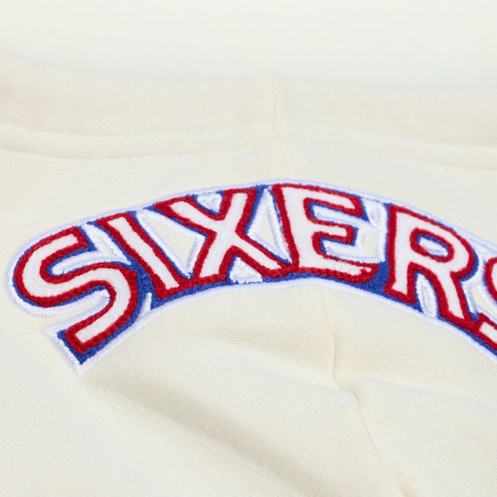 Philadelphia 76ers Hardwood Classics Chainstitch Premium Fleece Hoodie - Cream | Mitchell & Ness for sale