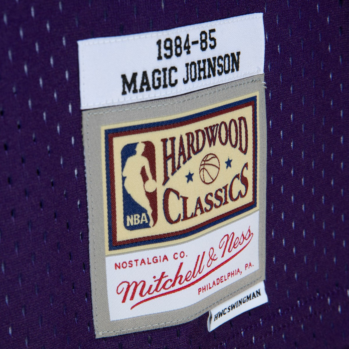 Magic Johnson Los Angeles Lakers 1984/85 Hardwood Classics Fadeaway Swingman Player Jersey - Purple/Black | Mitchell & Ness for sale